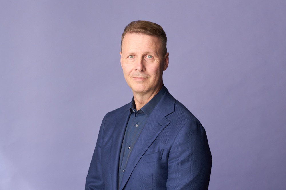Risto Siilasmaa against a purple background